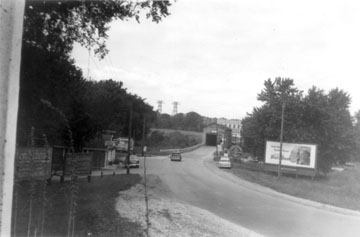 Tommy Inman's Liquor Store on left.