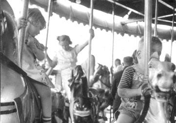 Esther and Bobby ride the horses